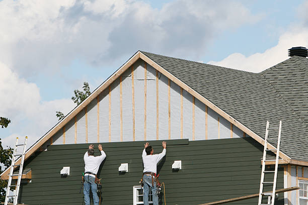 Professional Storm Damage Siding Repair technician working in Yorktown, IN